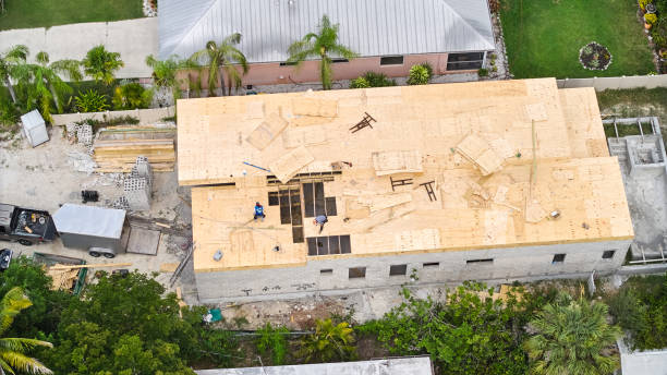 Aerial view of a house under construction, showcasing the framework and surrounding site preparations for General Contracting in Marietta, GA.